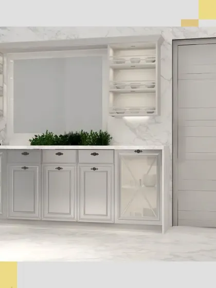 A view of the countertop area, showing the practical storage options with a mix of drawers and glass-fronted cabinets.