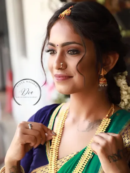 This candid shot shows how beautifully natural makeup photographs. The soft contouring and highlighting define her features, while the overall look remains light and comfortable. It’s a testament to simple, elegant bridal beauty.