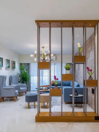 A wooden partition with built-in planters is a great way to divide a space while adding a touch of green. This design acts as both a functional separator and a beautiful decorative element.