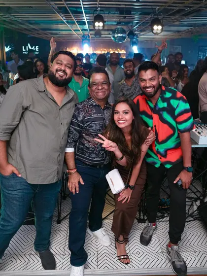 Posing with friends at the Gawky Goose for our iconic EDM nostalgia night.