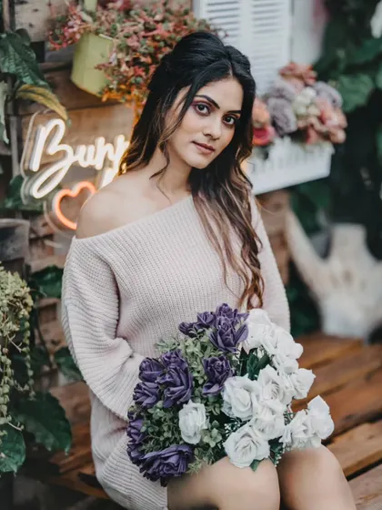 While I design the world your event lives in, my ultimate goal is to capture you in it. This is an example of my portrait photography, focusing on capturing natural expressions and candid moments against the beautiful backdrops we create together.