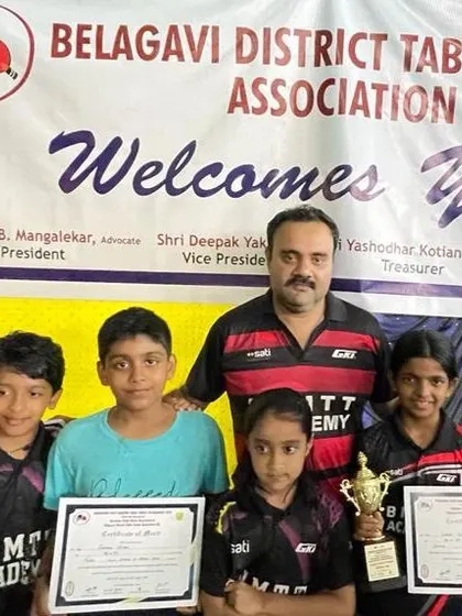 A group photo with our youngest medal winners at the Belgaum state ranking tournament.