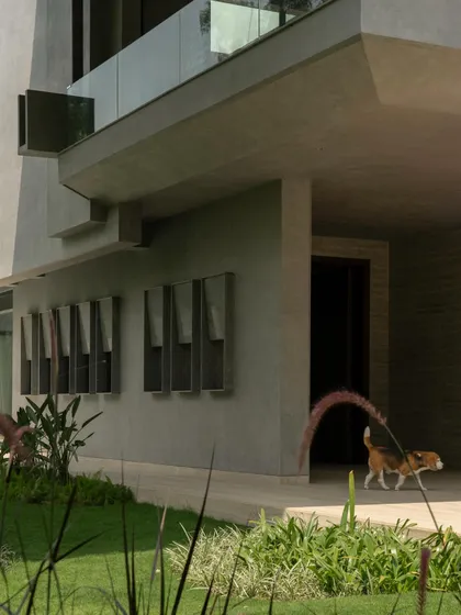 Various exterior perspectives that capture the dynamic geometry and the dance of light and shadow across the concrete surfaces throughout the day.