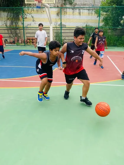 A close-up of a dribbling drill, showing the focus and concentration required.