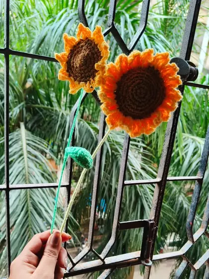 Two of my crochet sunflowers together. They come in slightly different sizes to look more natural, just like in a real field of sunflowers.