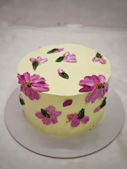 A simple yet elegant cake featuring palette knife painted flowers. This is a wonderful technique for beginners to learn, allowing you to create beautiful, textured floral designs with buttercream.