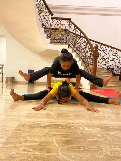 Some quick Acro Yoga before dinner. This playful pose combines a pancake stretch for the base and a firefly pose for the flyer.