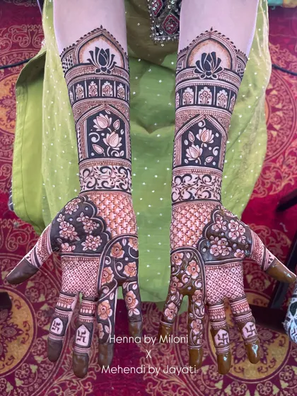 A beautiful, matching set of designs for the groom's mother and sister, featuring lotuses and architectural elements.