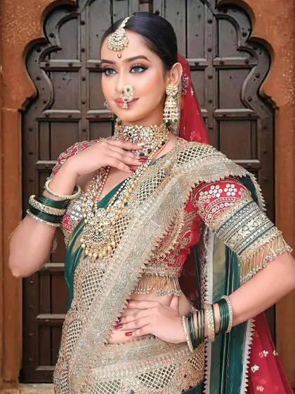 A full view of the royal Maharashtrian nauvari look we created for the Beauty Expo. The rich green and red combination paired with heavy jewelry creates a truly regal effect.