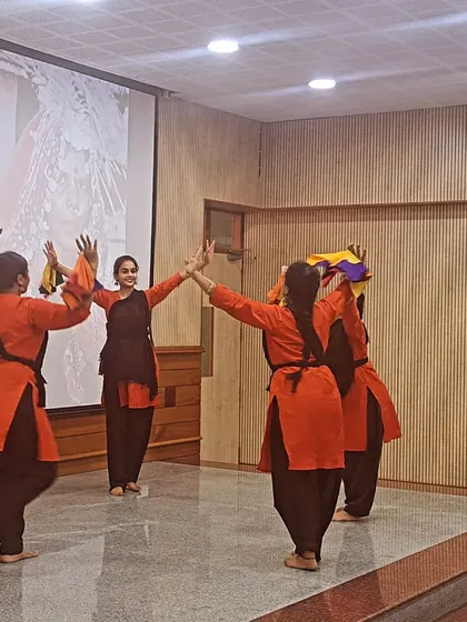 Another moment from the Lambani dance demonstration, showing the vibrant costumes and graceful movements.