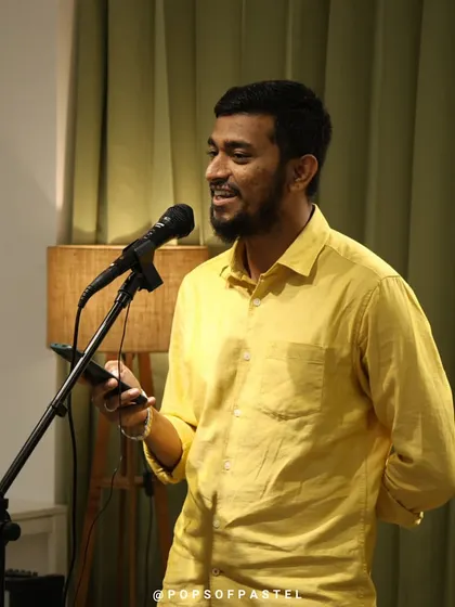A poet shares his work at our intimate performance venue in Basavanagudi.