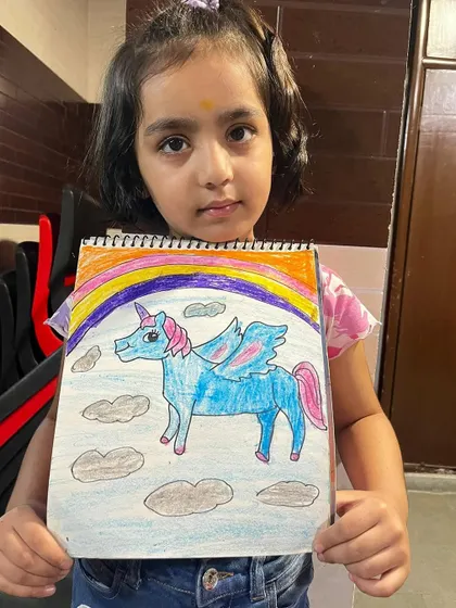 A magical unicorn complete with a rainbow, created by one of my talented students. My classes encourage kids to explore their imagination and bring fantasy worlds to life.