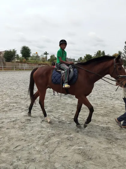 Horse riding is a favorite activity at our school, offering a full-body workout that builds strength, balance, and coordination. Here, a student enjoys a ride under expert supervision.