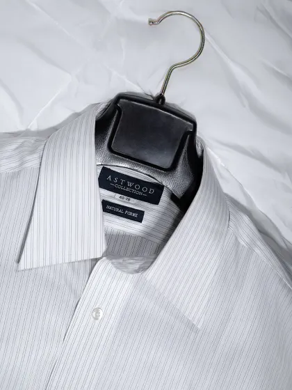 A minimalist shot of an Astwood formal shirt. The clean, simple presentation on a white background focuses on the shirt's quality and classic design.