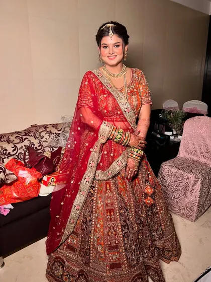 The complete bridal look, with the dupatta perfectly draped, ready for the wedding.