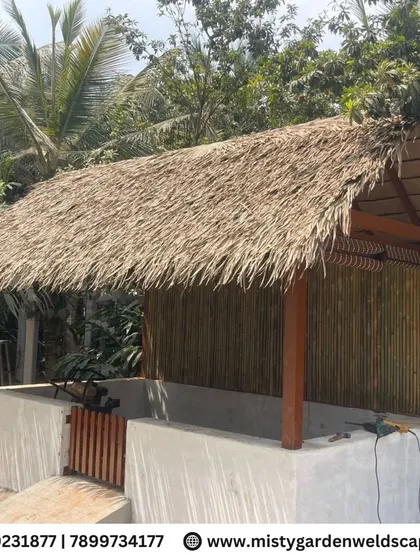 We undertake diverse farm infrastructure projects, like this premium cow shed. It features a strong structural frame, a traditional thatched roof for natural cooling, and bamboo walls for ventilation.