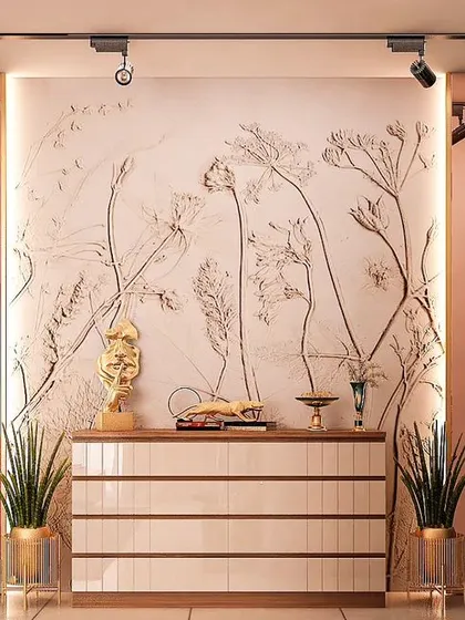 This foyer console is set against a wall with a delicate hand-painted floral mural. The combination of wood paneling, track lighting, and minimalist furniture creates a chic and modern entrance.