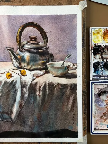 A still life of a metal teapot and a cup, from my watercolor course. The focus was on capturing the metallic reflections and the soft folds of the fabric.