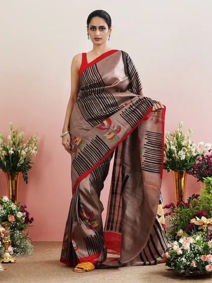 The full, standing view of the abstract printed saree, a true work of wearable art.