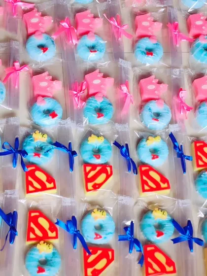 An overview of the superhero and princess-themed return favor sets, showing the variety I can offer for a single party.