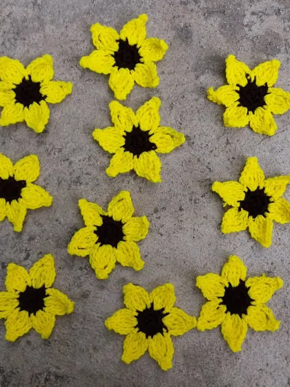 A collection of sunflower appliques. These can be used in various DIY projects or turned into keychains, magnets, and more.