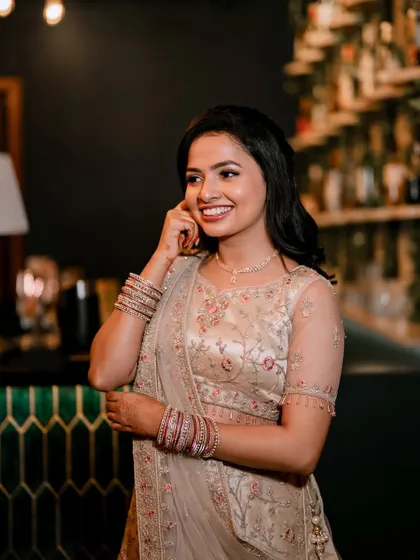 A candid, happy moment. The makeup is designed to look great in both posed and unposed photos.