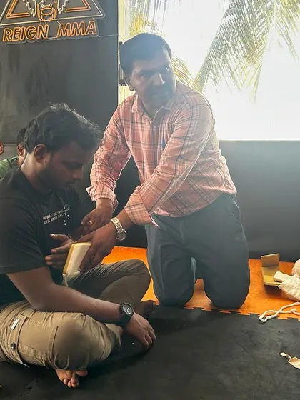A student learning how to properly apply a bandage during our first aid certification course.