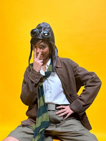 Another playful pose from the 'Faramōsh' shoot. The makeup was designed to be expressive and work with the quirky, vintage-inspired styling.