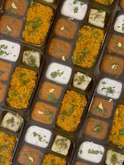 A tilted view of the neatly arranged meal boxes, showcasing the care I take in presentation, even for large orders.