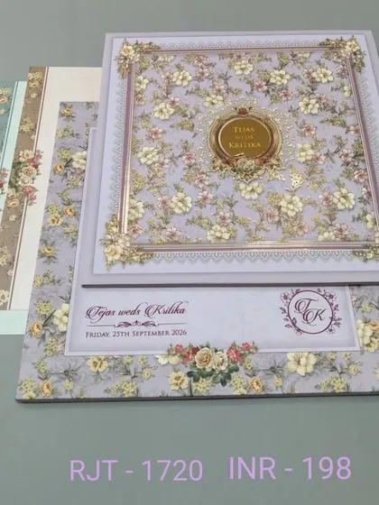 A lovely invitation with a dense floral pattern in pastel purple and yellow. The design is cheerful and romantic, perfect for a spring wedding.