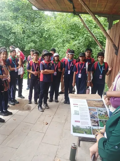 Students from VIBGYOR High listen to a briefing at the Aravalli Biodiversity Park before their nature walk to learn about ecological restoration.