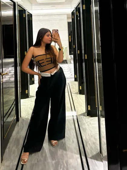 A final shot of the chic and modern outfit.