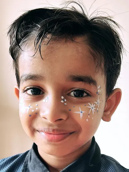 A sprinkle of winter magic. This simple and sweet snowflake design with white dots is perfect for little faces.