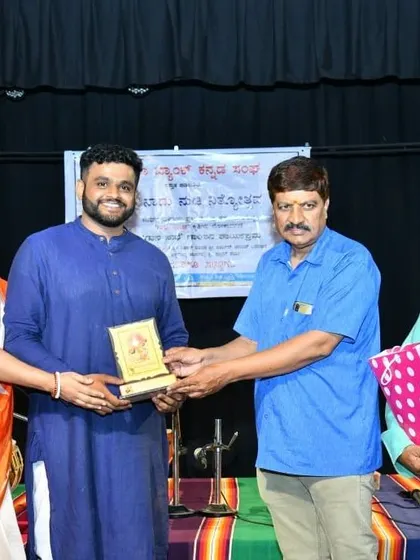 A proud moment receiving an award after a performance. I am always humbled and grateful for any recognition of my dedication to music.