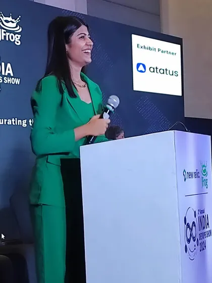 A candid moment from the India DevOps Show 2024. A smile and a confident presence are key to making the audience feel comfortable and engaged.
