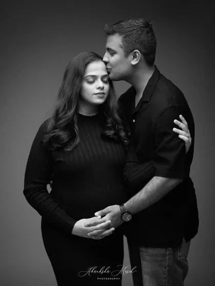A tender moment captured in both color and monochrome, showing the versatility of a single pose to convey different emotions.