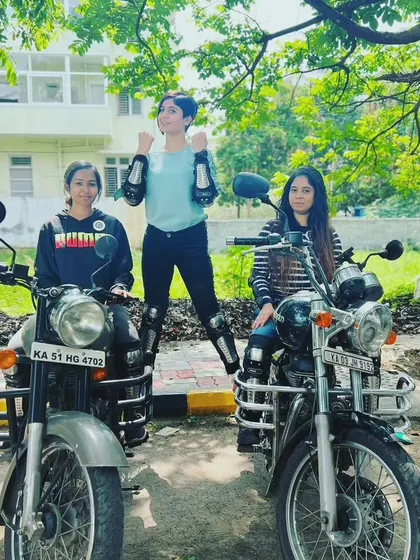 A triumphant pose from our graduates. They have conquered their fears and are now confident, capable riders.