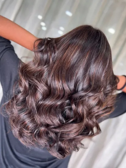 Another shot of the magical brown curls, showing off their texture and shine from the back.