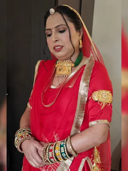 The complete Rajasthani look is so regal and beautiful. I ensure the makeup complements the heavy jewelry and bright attire.
