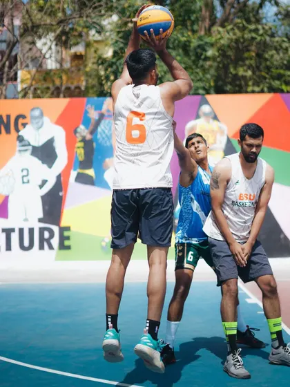 Getting ready to shoot over defenders at the 3x3 Baseline Hoops tournament.