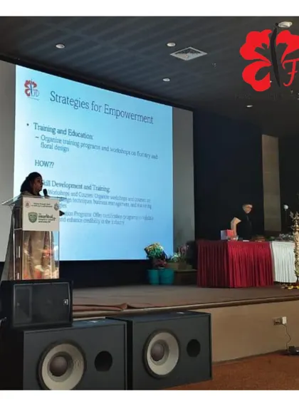 Our team presenting on "Strategies for Empowerment" through floral design and education at a large-scale event. We are passionate about sharing how floristry can be a powerful tool for skill development and financial independence.