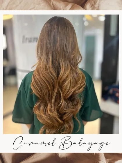 A framed shot of our Caramel Balayage, highlighting its rich tones and expert application. It's a classic choice for a reason.