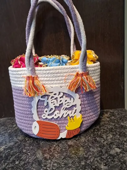 Another angle of the Lohri jute hamper, showing its sturdy rope handles.