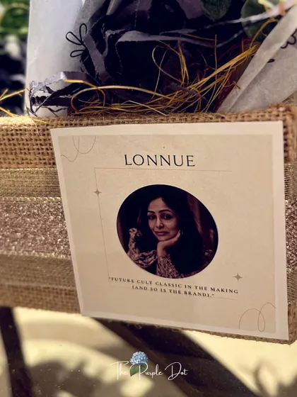 A personalized tag featuring the founder, created to honor her journey and the launch of her new brand.