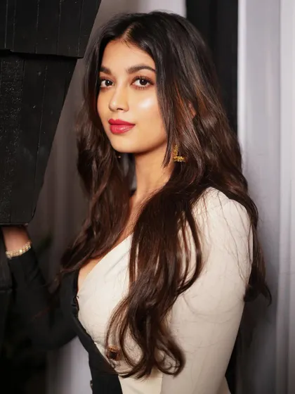A classic and elegant portrait of actress Digangana Suryavanshi. The soft lighting and simple composition create a timeless beauty shot.