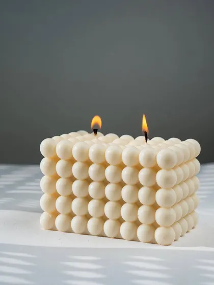 Get ready to fall in love with our candles all over again. Our large two-wick bubble candle is a real statement piece.