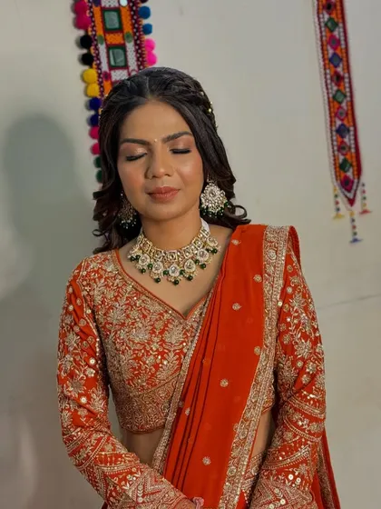 A close-up of the makeup, highlighting the flawless base and the soft, neutral tones that enhance her features.