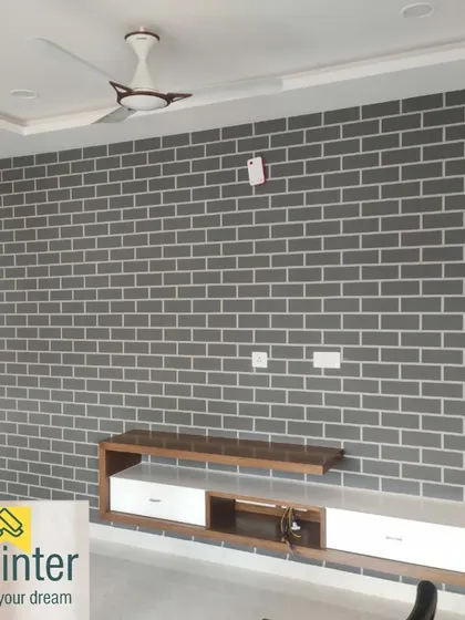 A grey brick pattern provides a more subtle, contemporary take on the exposed brick look. This finish works well in bedrooms or living areas with a minimalist aesthetic.