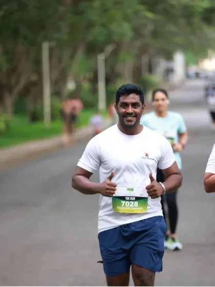 Another shot of me on the course, encouraging my team and enjoying the run.