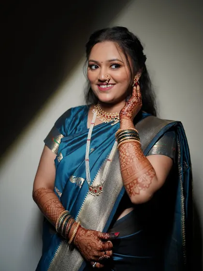 Another lovely portrait of Shivali, showcasing her gentle smile and the timeless elegance of her engagement look.